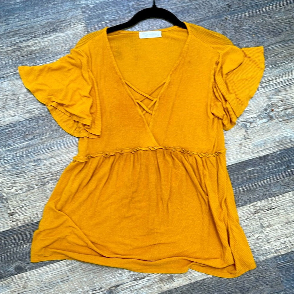 My favorite maternity top of all time. So flattering and cute. Love the color